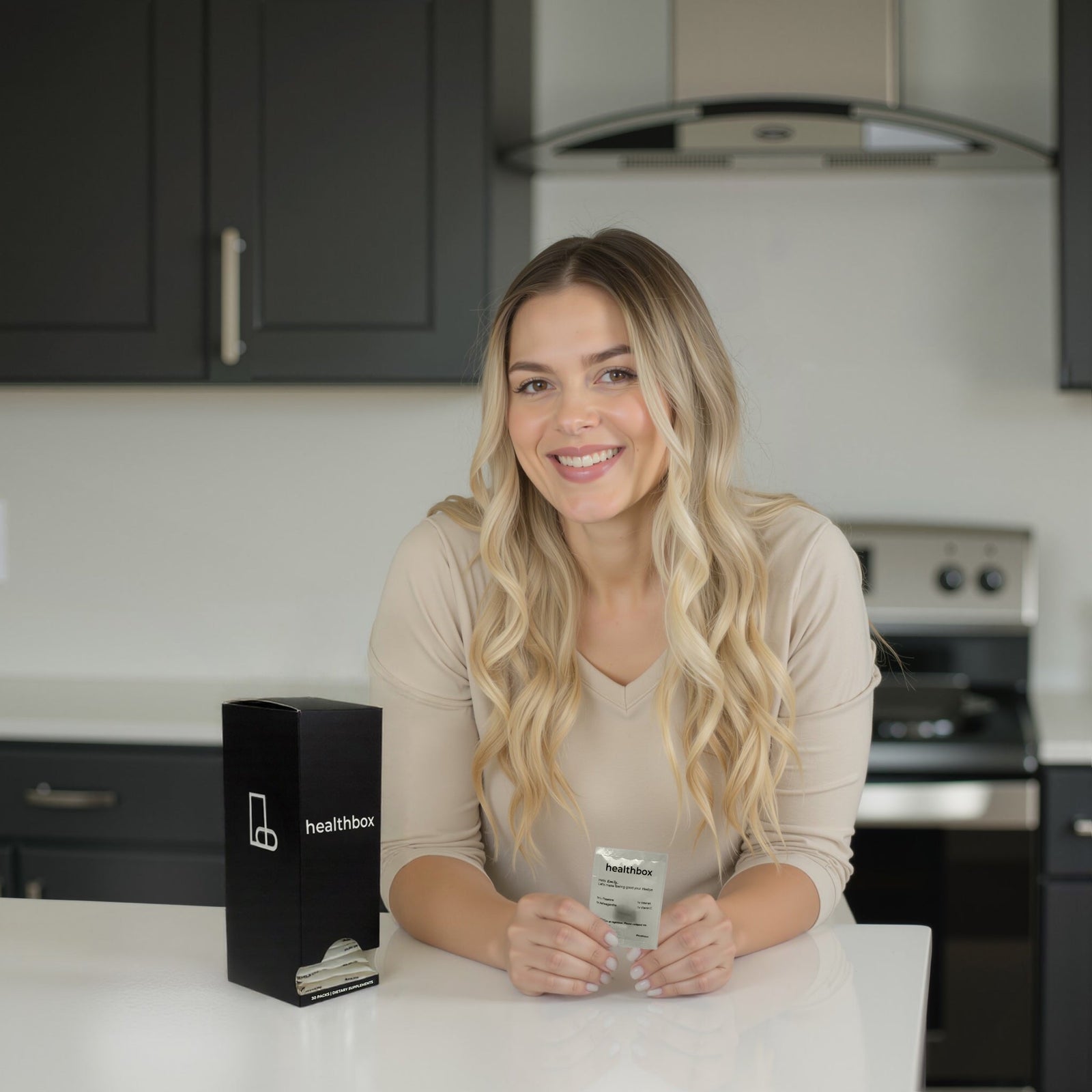 Vitamin E 200 IU daily sachets by Healthbox personalized vitamins with a black branded box on kitchen counter