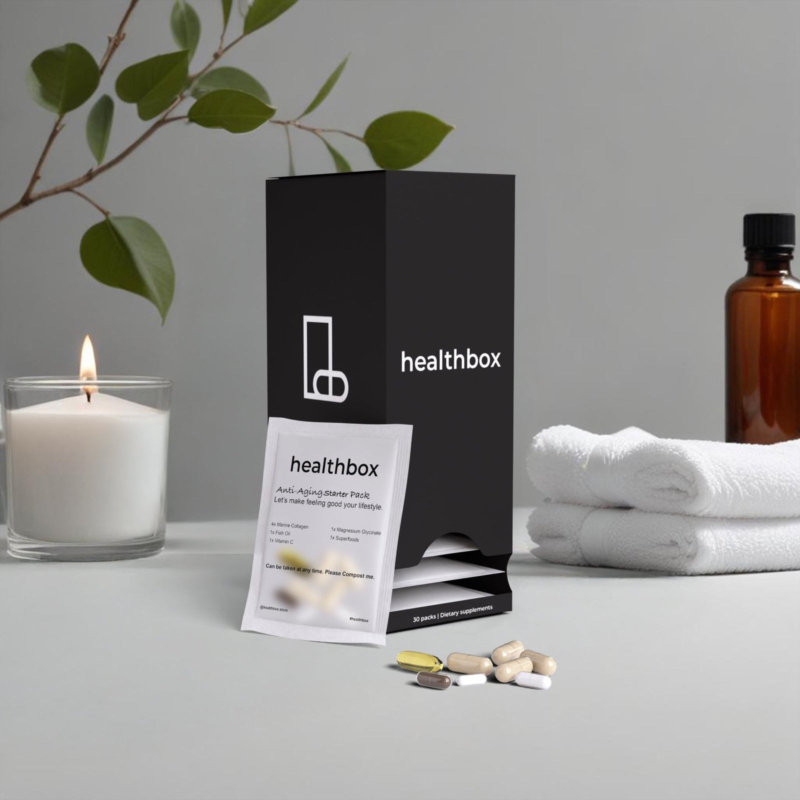 Anti-Aging Starter Pack daily sachets with vitamins and supplements by Healthbox displayed with several capsules.
